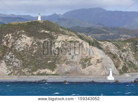 The view of two lighthouses of Pencarrow Head at the entrance to Wellington Harbour (New Zealand).