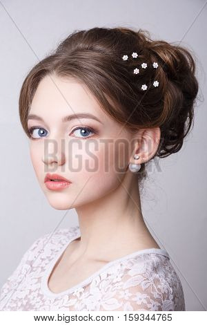 young beautiful girl. studio portrait. retouch. makeup