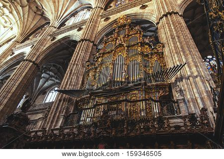 SALAMANCA, SPAIN - SEPTEMBER 24, 2013: Organ of the Gospel in the New Cathedral created by Pedro de Echevarria in 1744.