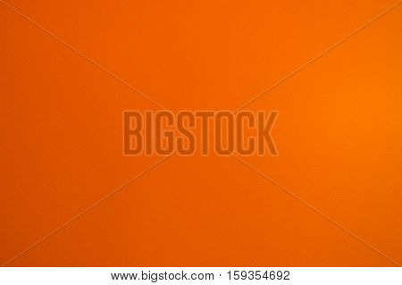 Macro of a orange colored wall texture background