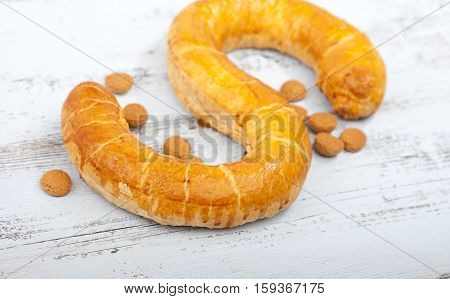 Traditional Dutch cookie Banketletter at Sinterklaas celebration on wooden background