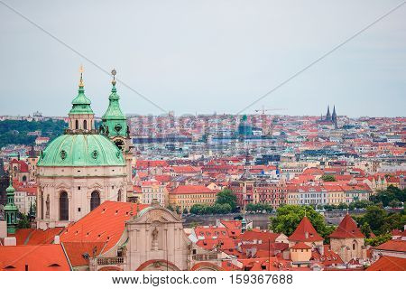 Aerial view of ancient building with red roofs in Praga