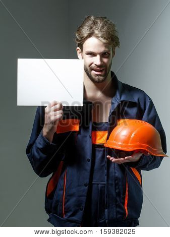 Smiling Man Keeps Hard Hat