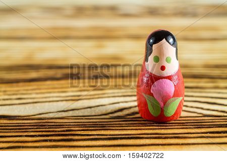 Russian dolls on a wooden table. Matrioshka.