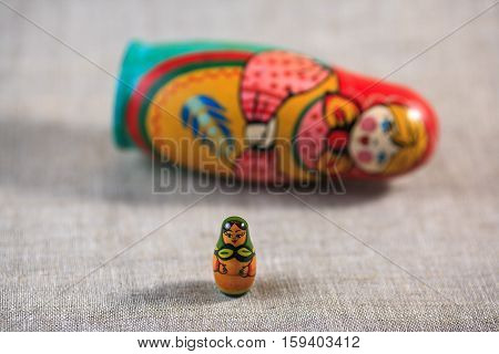Russian dolls. Matryoshka on linen fabric for the background.