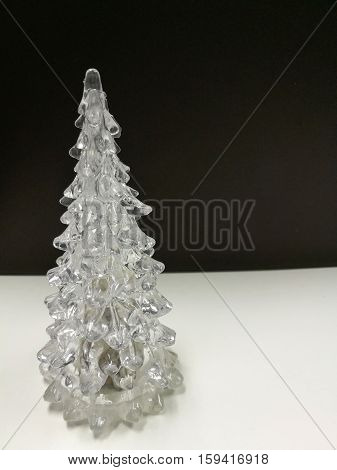 Merry Christmas and Happy New Year white clear Xmas tree with brown background on the vertical side