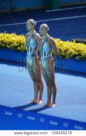 RIO DE JANEIRO, BRAZIL - AUGUST 15, 2016: Huang Xuechen and Sun Wenyan of team China compete during synchronized swimming duets free routine preliminary of the Rio 2016 Olympic Games