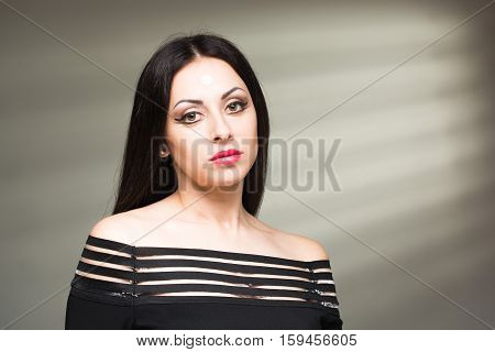 sexy girl model with shadow from the blinds