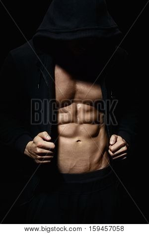 Athletic Strong Sexual Man Abs Six Pack Muscles Bodybuiding And Fitness Concept. Studio shot, Low key