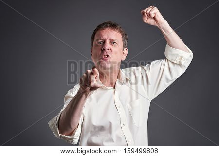 Portrait of a angry middle age man getting fury