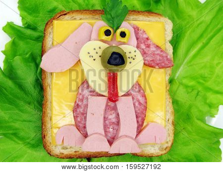 creative sandwich with cheese and salame dog shape