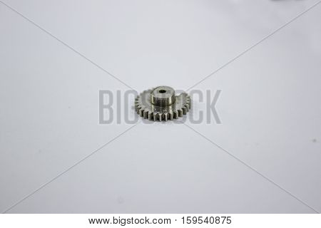 nickel, shiny, gear on a white background