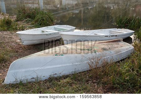 White boat on the river in a frosty morning