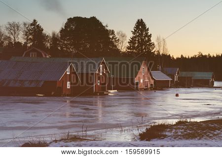 Fisherman village in Sweden at winter after sunset - winter seasonal scandinavian background