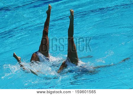RIO DE JANEIRO, BRAZIL - AUGUST 15, 2016: Huang Xuechen and Sun Wenyan of team China compete during synchronized swimming duets free routine preliminary of the Rio 2016 Olympic Games