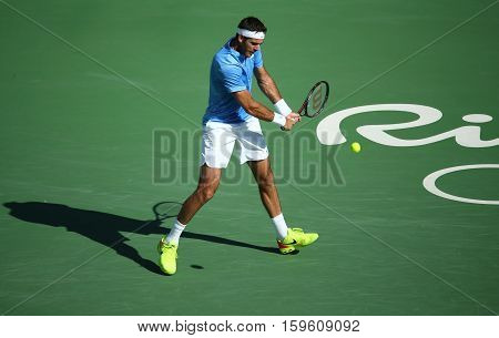 RIO DE JANEIRO, BRAZIL - AUGUST 13, 2016: Grand Slam champion Juan Martin Del Potro of Argentina in action during his semifinal match of the Rio 2016 Olympic Games at the Olympic Tennis Centre