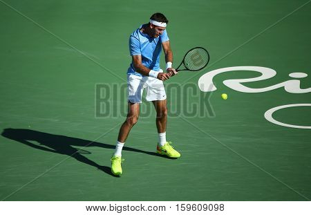 RIO DE JANEIRO, BRAZIL - AUGUST 13, 2016: Grand Slam champion Juan Martin Del Potro of Argentina in action during his semifinal match of the Rio 2016 Olympic Games at the Olympic Tennis Centre