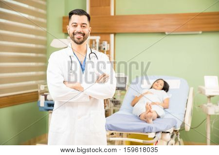 Hispanic Doctor With A Pregnant Patient