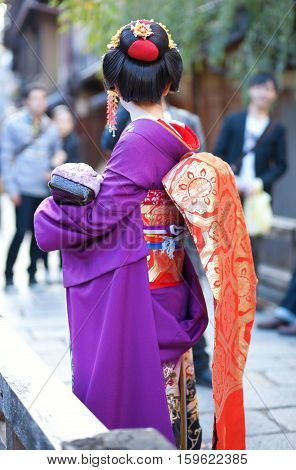 Young Maiko On A Street Of Gion, Kyoto, Japan