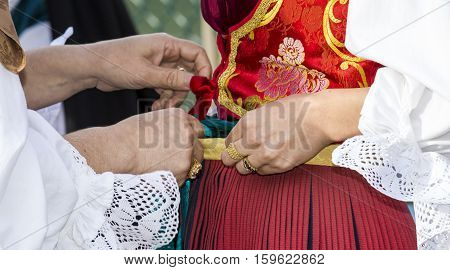 CAGLIARI, ITALY - May 1, 2014: 358 Religious Procession of Sant'Efisio - Sardinia - detail of a female traditional Sardinian costumes