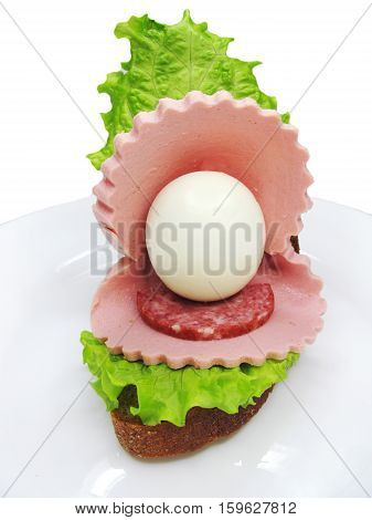 creative sandwich with cheese and salame sea shell shape