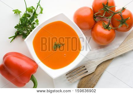 Tomato coulis sauce with bell pepper seen from above.