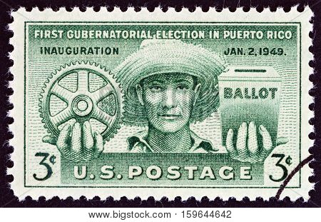 USA - CIRCA 1949: A stamp printed in USA issued for the 1st Gubernatorial Election in Puerto Rico shows Puerto Rican, Cogwheel and Ballot Box, circa 1949.