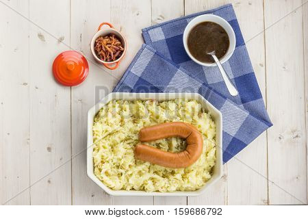 Typical Dutch Dish Zuurkool With Sauerkraut, Smoked Sausage And Gravy
