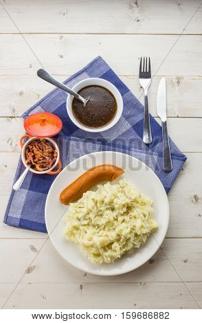 Typical Dutch Dish Zuurkool With Sauerkraut, Smoked Sausage And Gravy