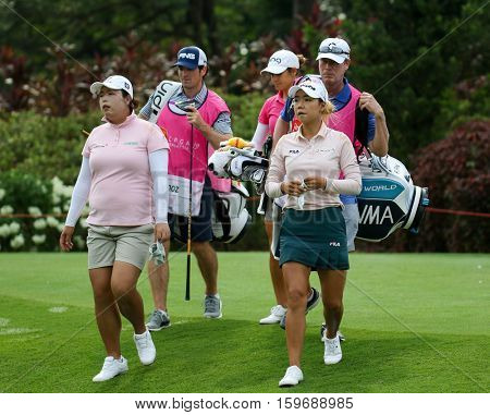 KUALA LUMPUR, MALAYSIA - OCTOBER 29, 2016: LPGA golfers walks to the fairway after tee off at 1st T-box of the TPC Golf Course at the 2016 Sime Darby LPGA Malaysia golf tournament.