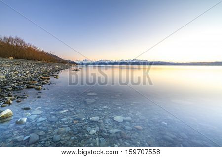 Lake stone and rock during sunrise moment