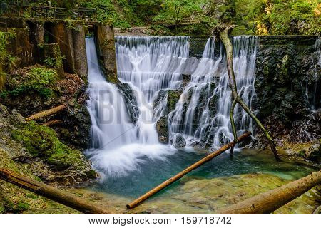 Waterfall at the Vintgar gorge, beauty of nature, with river Radovna flowing through, near Bled, Slovenia.