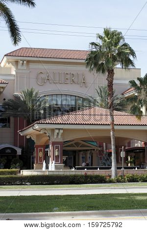 Fort Lauderdale FL USA - April 30 2016: Entrance signs to Galleria Mall at Palm Court market entry. Front entrance to the Galleria Mall nearest restaurants.