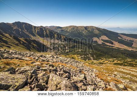 Mountain Landscape on Sunny Day with Rocks in Foreground. Mount Derese Low Tatras Mountain Slovakia.