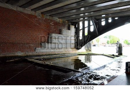 Tunnel with floodgate in a canal in Amsterdam
