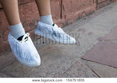 Visitors Wear Disposable Socks Inside The Taj Mahal Monument To Protect The Marble Floors From Damag