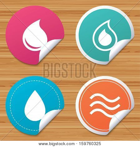 Round stickers or website banners. Water drop icons. Tear or Oil drop symbols. Circle badges with bended corner. Vector