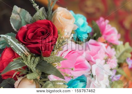 beautiful fake white and pink rose for decorationselective focus.