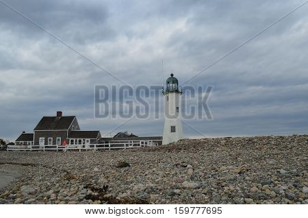Gray skies and tumultuous clouds over Old Scitaute Light.