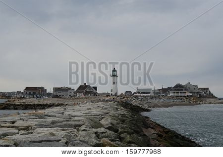 Neighborhood with Old Scituate Light standing tall.