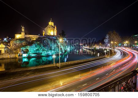 Night Evening Illuminated View Of The Metekhi Church And The Equestrian Statue Of King Vakhtang Gorg