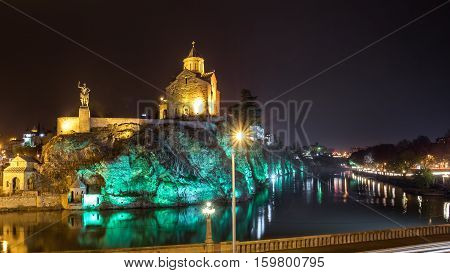 Night Evening Illuminated View Of The Metekhi Church And The Equestrian Statue Of King Vakhtang Gorg