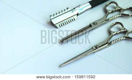 Scissors for cut hair on the white background.Tools for hair cut.