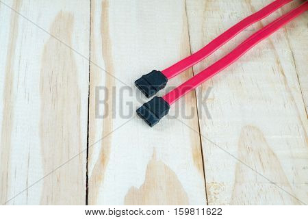 Red SATA cable use for connection with a computer
