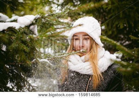 Young Woman In A Forest With Fir And Pine Trees On The Streets, Tree Branches Touching Hands, Brushi