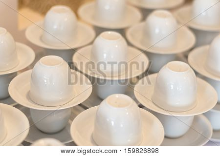 many white empty coffee cup preparation for coffee break of wedding eventselective focus.