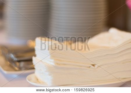 tissue paper on table in restaurantselective focus.