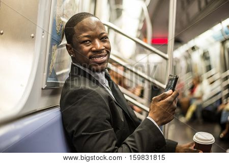 Businessman in full suit in New York subway metro