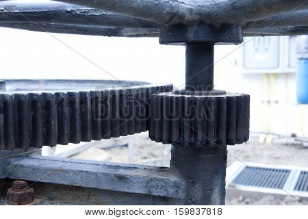 mechanical gear with a large toothed wheel of Floodgate valve