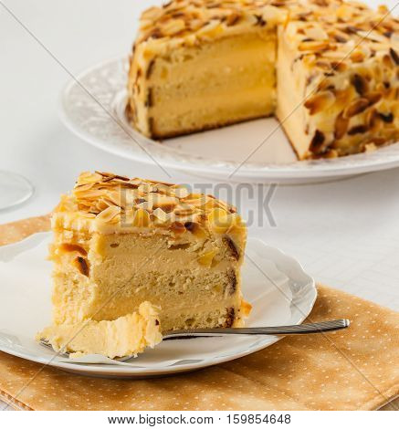 Madame Pompadour cake slice covered with almonds
